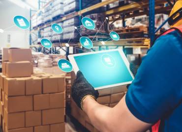 smart warehouse tablet retrieving pallettes from the racks