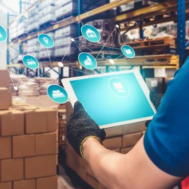smart warehouse tablet retrieving pallettes from the racks